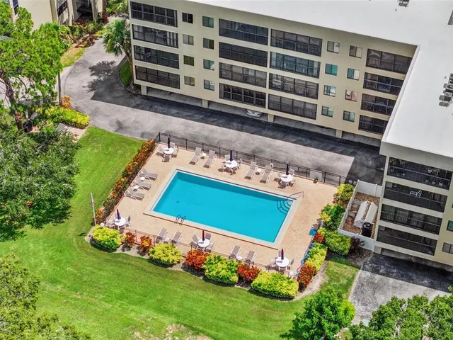 a front view of a building with garden