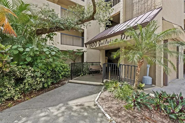 a sign that is on a brick building