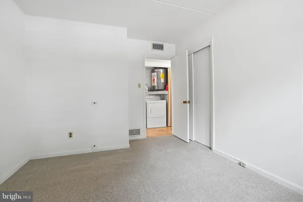 an empty room with closet