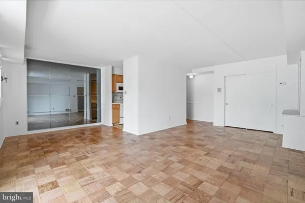 a sign broad in front of a brick building