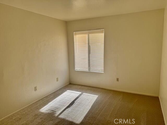 2125 Bramble Lane Palmdale, CA 93550 - Photo 14 of 28 an empty room with a window
