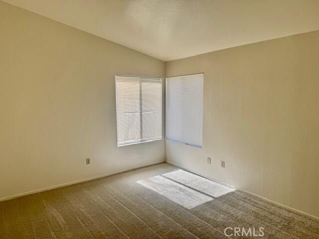 2125 Bramble Lane Palmdale, CA 93550 - Photo 16 of 28 an empty room with windows
