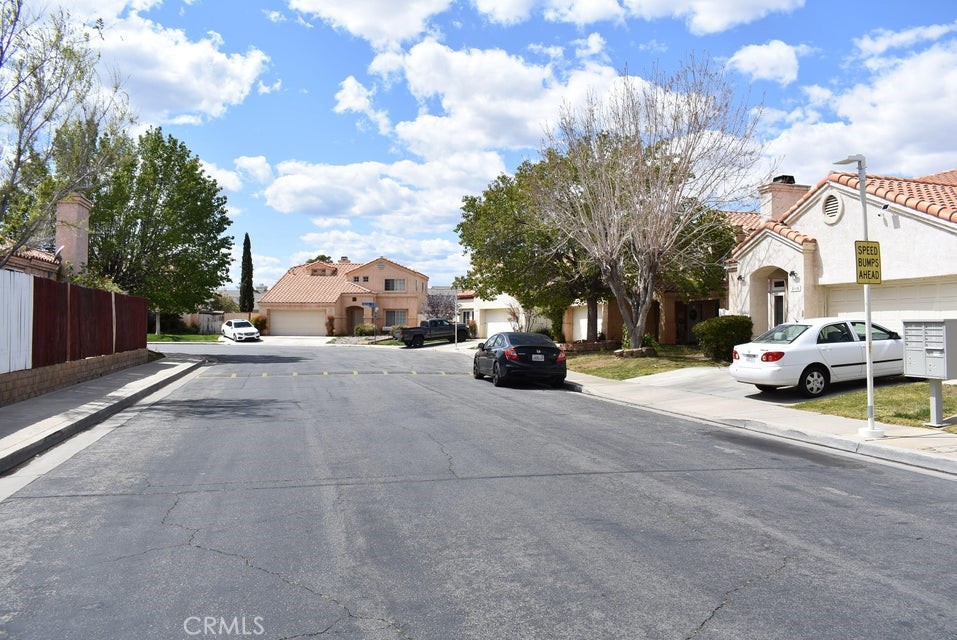 2125 Bramble Lane Palmdale, CA 93550 - Photo 24 of 28 a view of street with parked cars