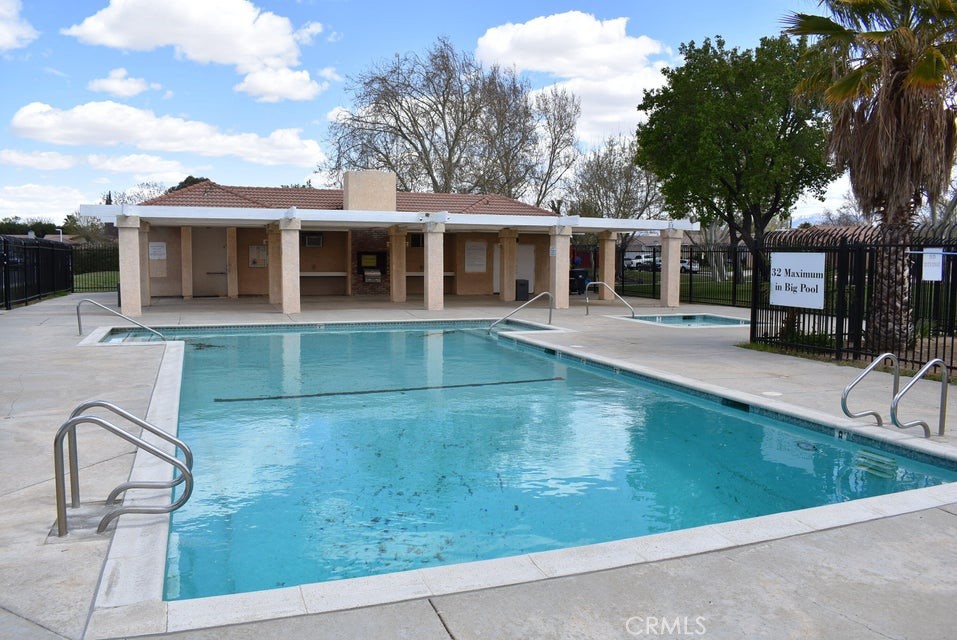 2125 Bramble Lane Palmdale, CA 93550 - Photo 25 of 28 a view of a house with a backyard