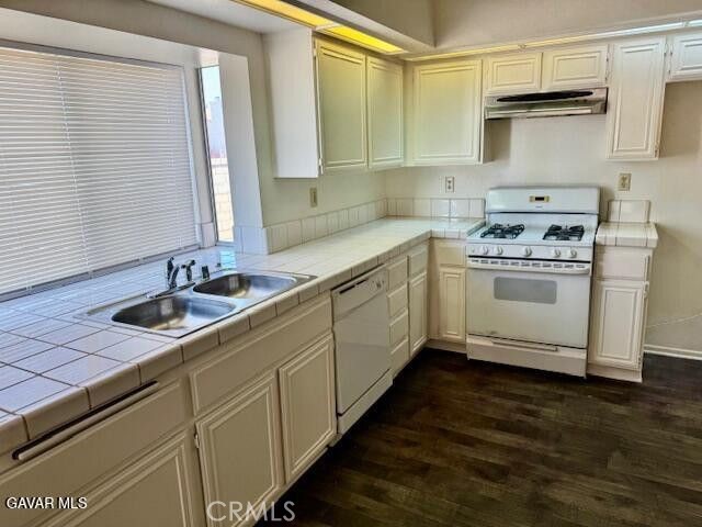 2125 Bramble Lane Palmdale, CA 93550 - Photo 7 of 28 a kitchen with stainless steel appliances granite countertop a sink a stove and cabinets