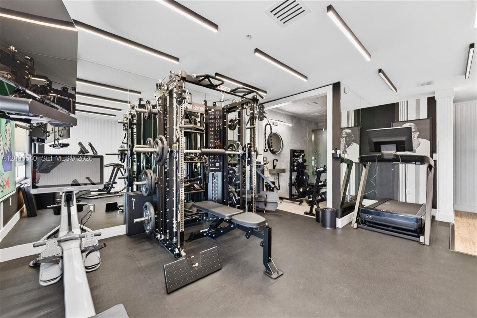 90 Southwest 3rd Street, Unit PH12 Miami, FL 33130 - Photo 29 of 40 a view of a room with gym equipment