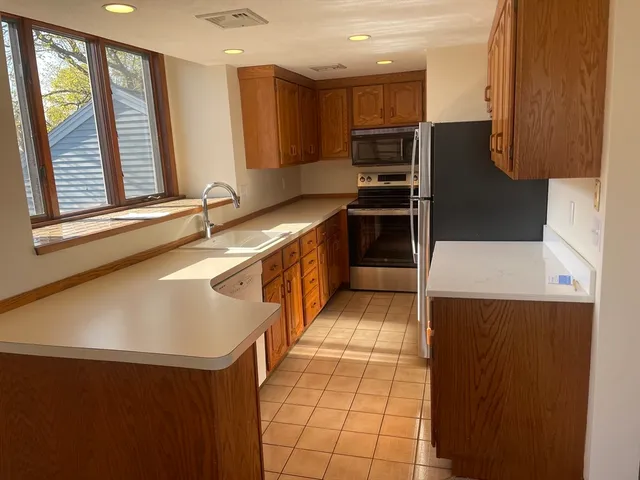 a bathroom with a sink and mirror