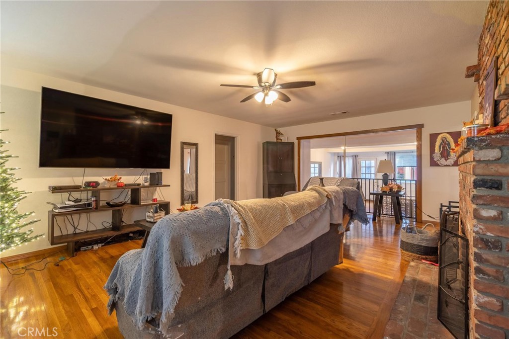 9920 Broadway Temple City, CA 91780 - Photo 11 of 26 a living room with furniture and a flat screen tv