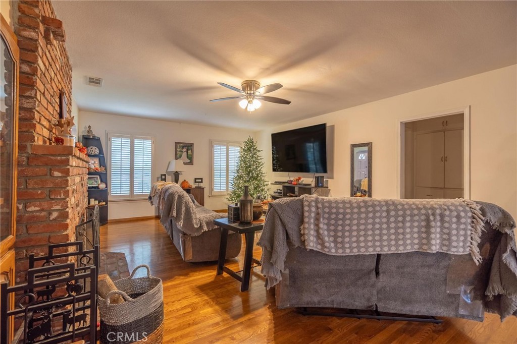 9920 Broadway Temple City, CA 91780 - Photo 12 of 26 a living room with furniture fireplace and flat screen tv