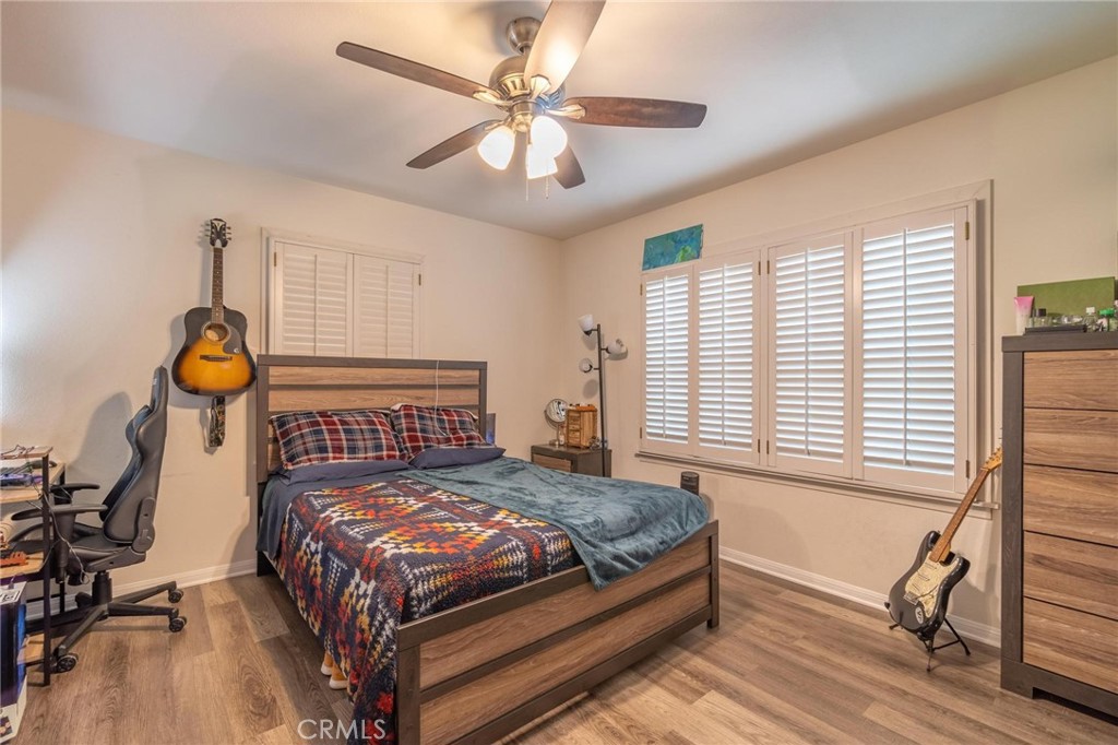 9920 Broadway Temple City, CA 91780 - Photo 14 of 26 a bedroom with a bed and window