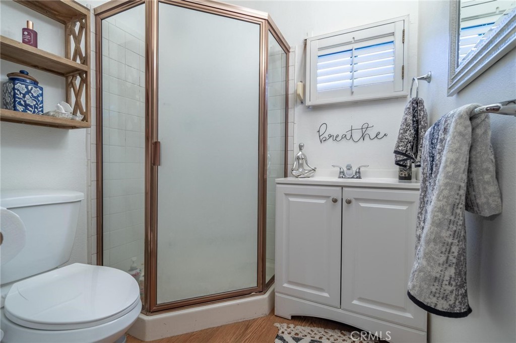 9920 Broadway Temple City, CA 91780 - Photo 17 of 26 a bathroom with a toilet and a shower curtain