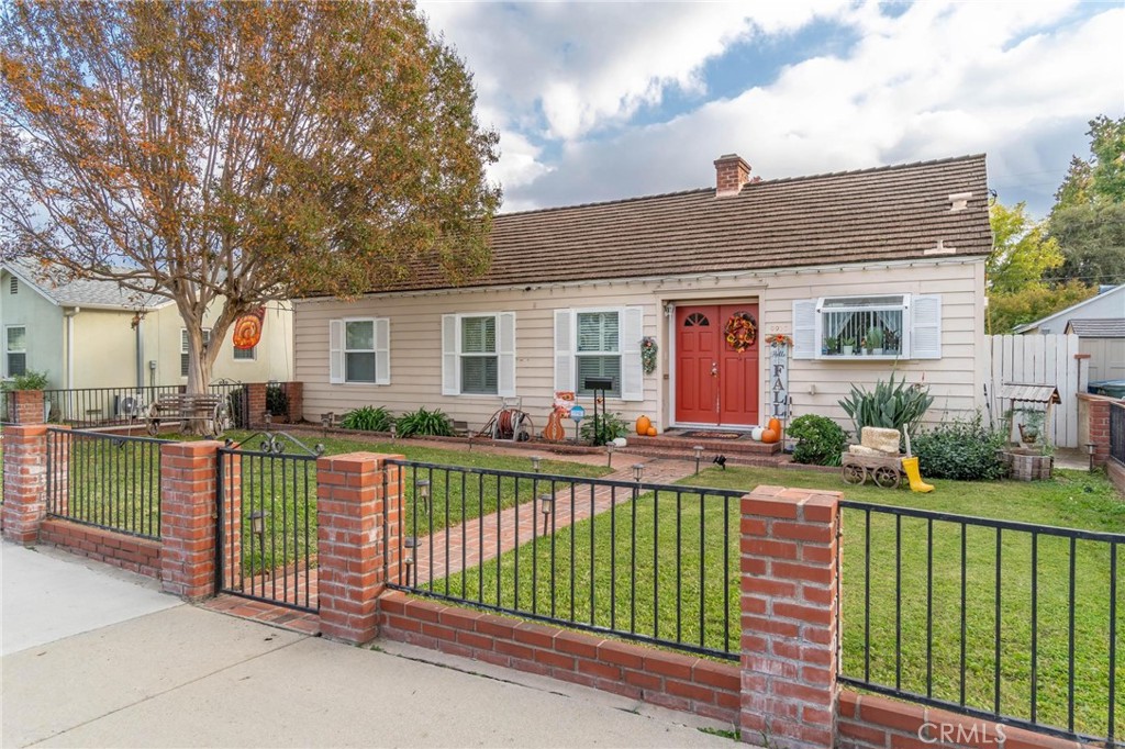 9920 Broadway Temple City, CA 91780 - Photo 2 of 26 a view of a house with a wooden deck and a yard