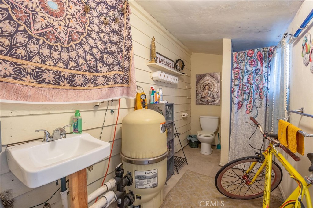 9920 Broadway Temple City, CA 91780 - Photo 26 of 26 a bathroom with a sink toilet and shower