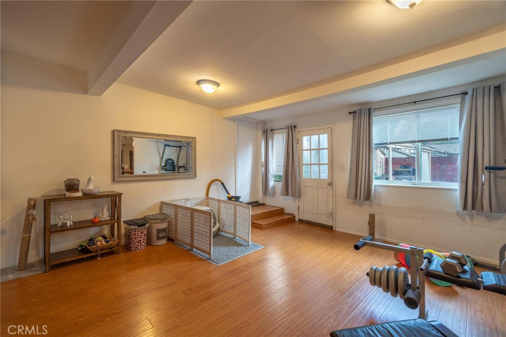 9920 Broadway Temple City, CA 91780 - Photo 9 of 26 a living room with furniture and a wooden floor