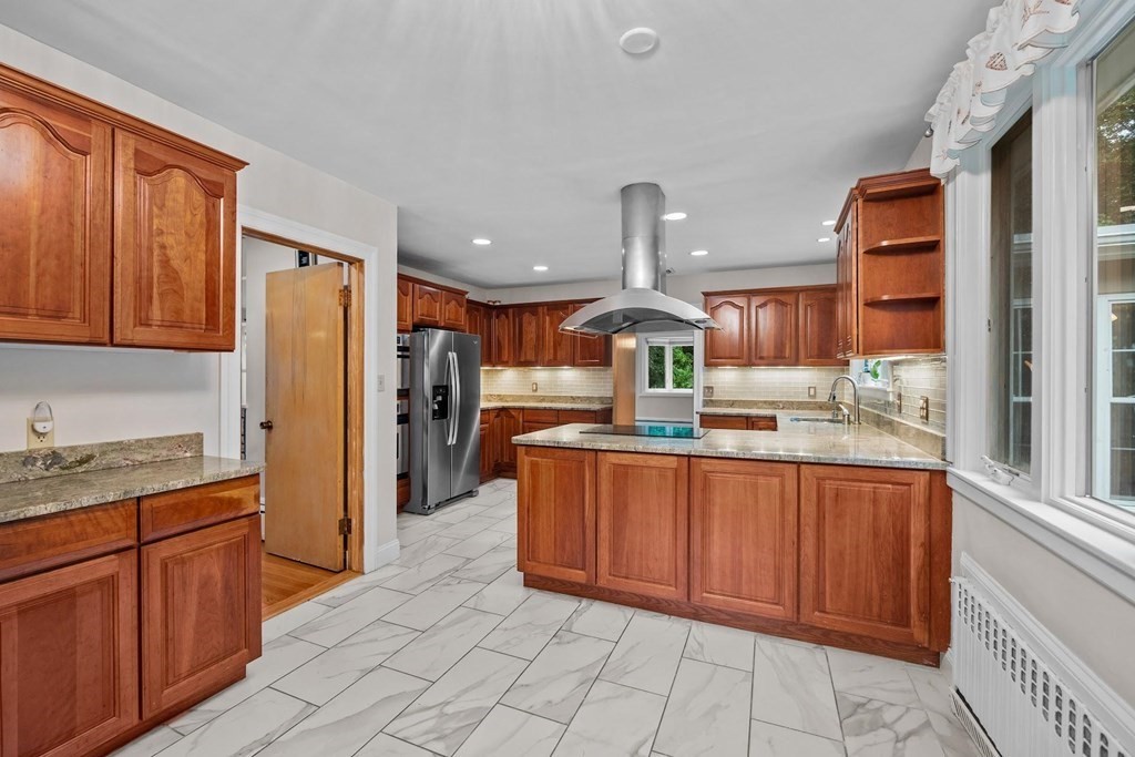 42 Bypass Road Lincoln, MA 01773 - Photo 11 of 42 a kitchen with stainless steel appliances granite countertop a refrigerator and a sink
