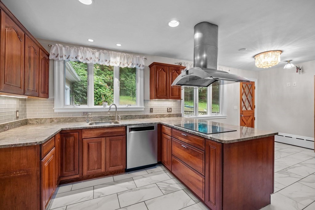 42 Bypass Road Lincoln, MA 01773 - Photo 13 of 42 a kitchen with stainless steel appliances granite countertop a sink and a stove