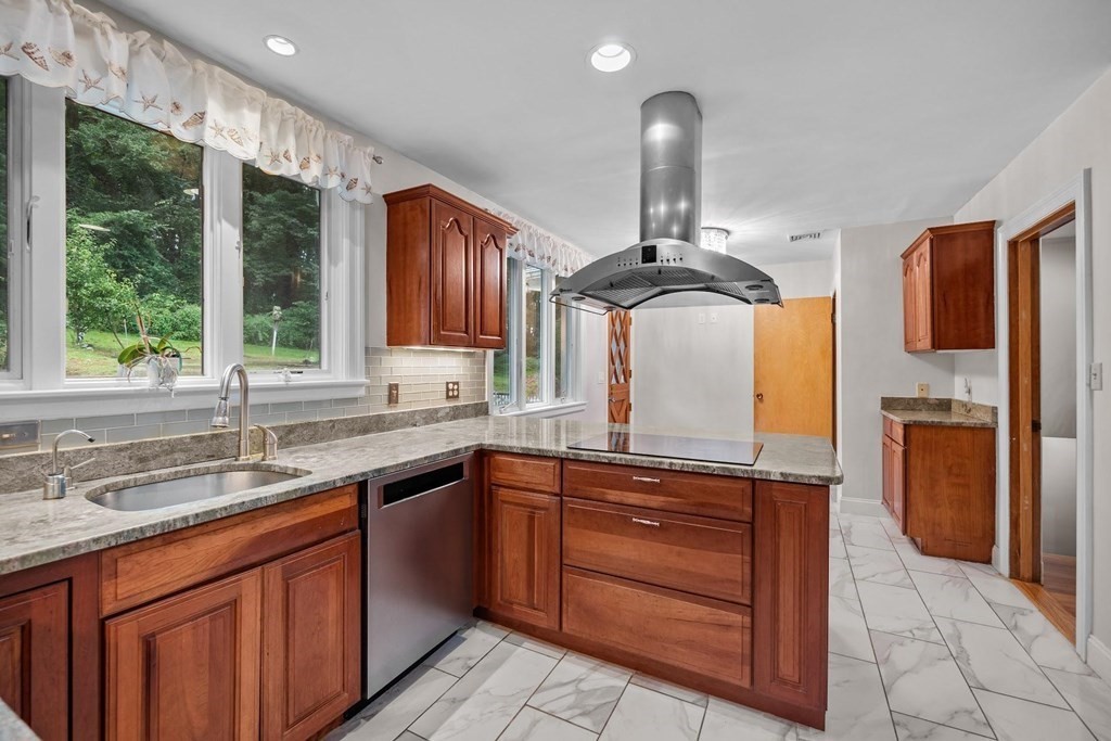42 Bypass Road Lincoln, MA 01773 - Photo 15 of 42 a kitchen with stainless steel appliances granite countertop a sink stove and refrigerator