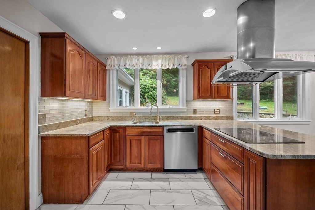42 Bypass Road Lincoln, MA 01773 - Photo 16 of 42 a kitchen with stainless steel appliances granite countertop a sink and a stove