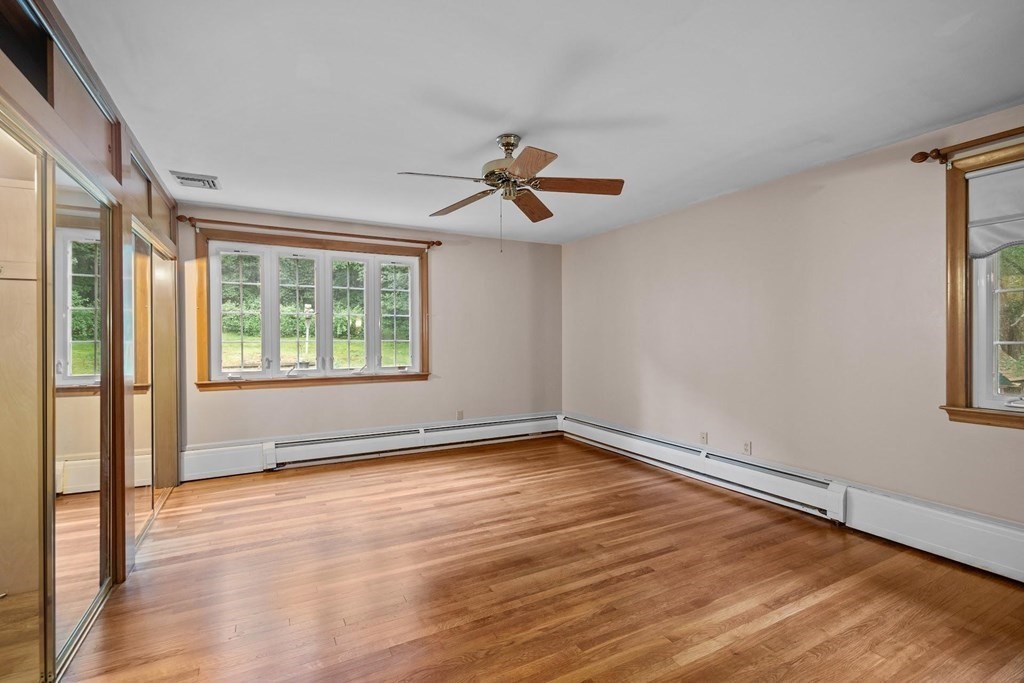 42 Bypass Road Lincoln, MA 01773 - Photo 20 of 42 wooden floor in an empty room with a window