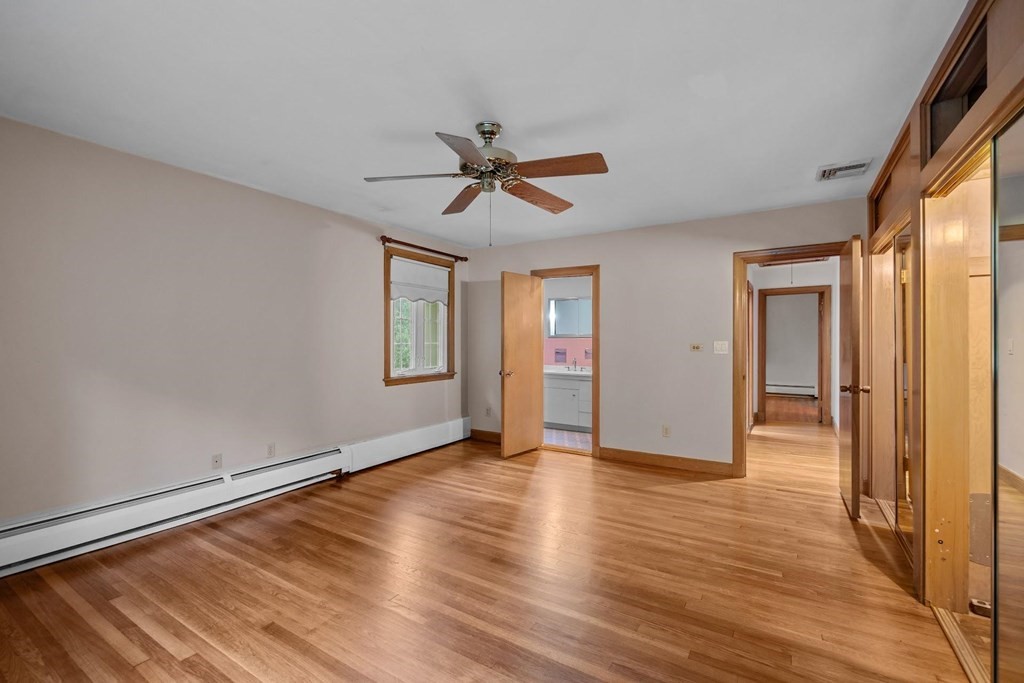 42 Bypass Road Lincoln, MA 01773 - Photo 21 of 42 wooden floor in an empty room with a window