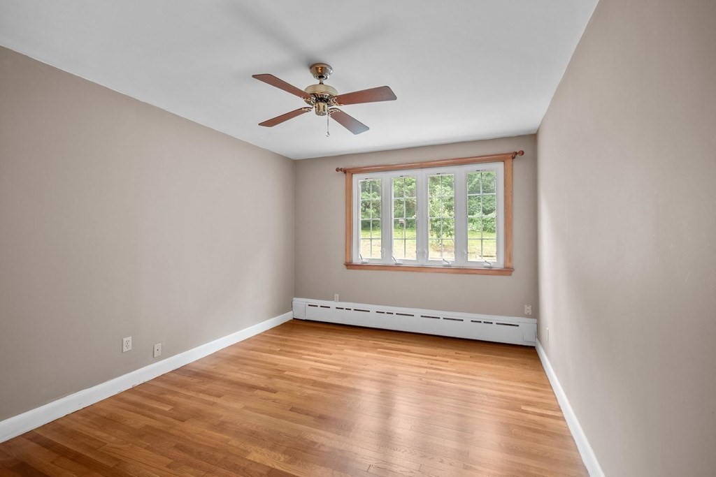 42 Bypass Road Lincoln, MA 01773 - Photo 22 of 42 wooden floor in an empty room with a window