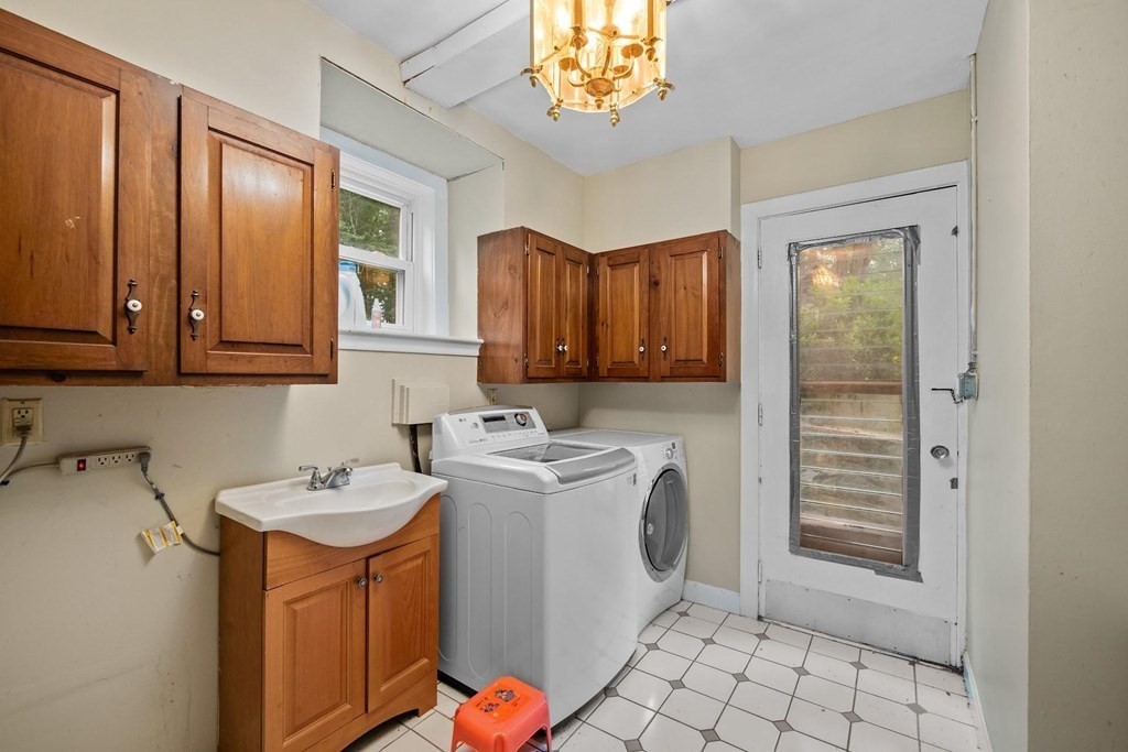 42 Bypass Road Lincoln, MA 01773 - Photo 32 of 42 a utility room with dryer and washer