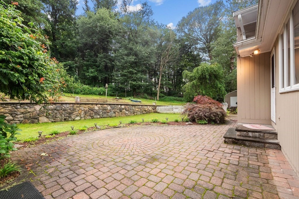 42 Bypass Road Lincoln, MA 01773 - Photo 36 of 42 a view of a yard with potted plants