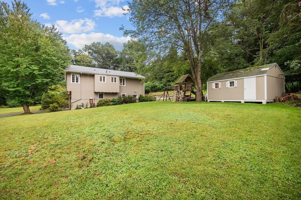 42 Bypass Road Lincoln, MA 01773 - Photo 39 of 42 a view of a house with a yard