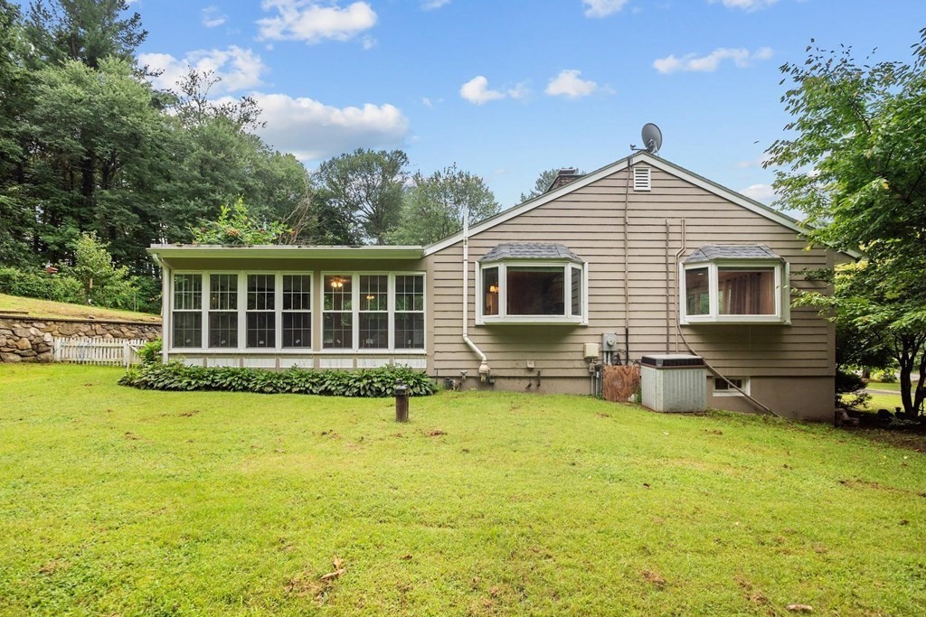 42 Bypass Road Lincoln, MA 01773 - Photo 41 of 42 a view of a house with swimming pool and porch with furniture