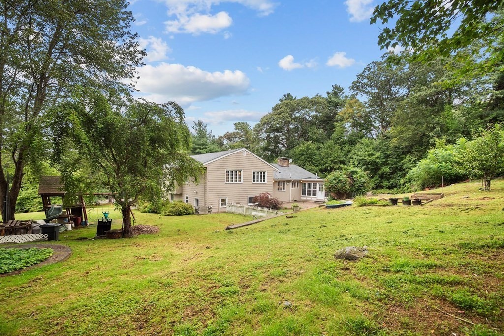 42 Bypass Road Lincoln, MA 01773 - Photo 42 of 42 a house view with a garden space