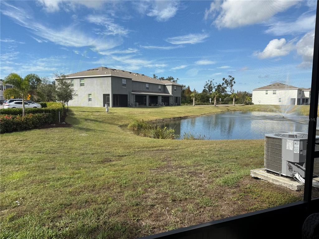 9011 Milestone Drive Sarasota, FL 34238 - Photo 11 of 32 a view of a house with a yard