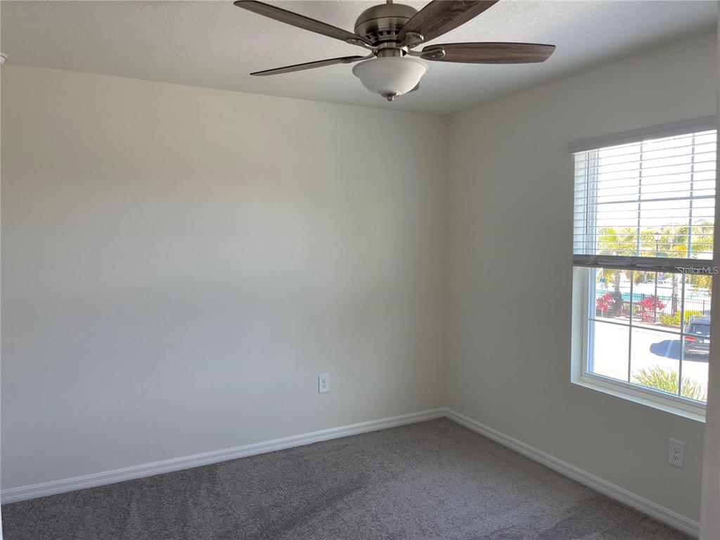 9011 Milestone Drive Sarasota, FL 34238 - Photo 19 of 32 an empty room with a window