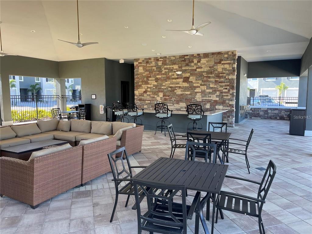 9011 Milestone Drive Sarasota, FL 34238 - Photo 27 of 32 a view of a dining room with furniture