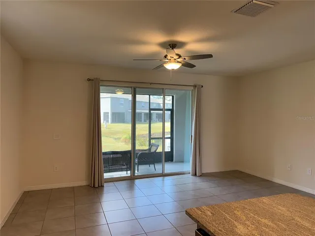 a kitchen with stainless steel appliances a sink stove refrigerator and cabinets