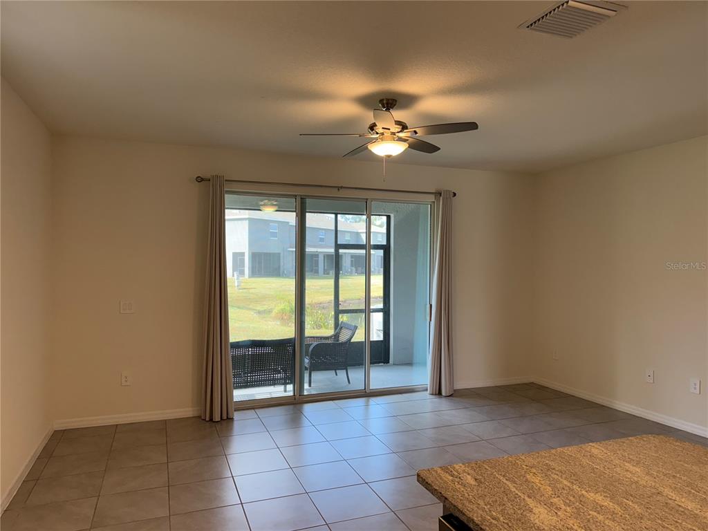 9011 Milestone Drive Sarasota, FL 34238 - Photo 5 of 32 a view of an empty room with a window