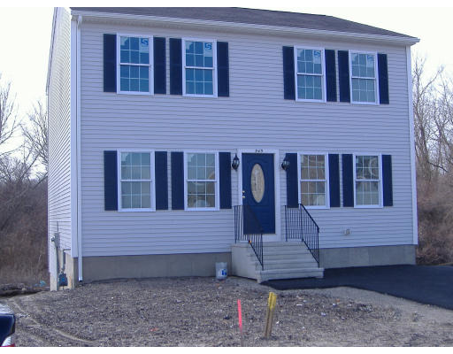 545 Detroit Street Fall River, MA 02721 - Photo 1 of 1 a view of brick house with large windows