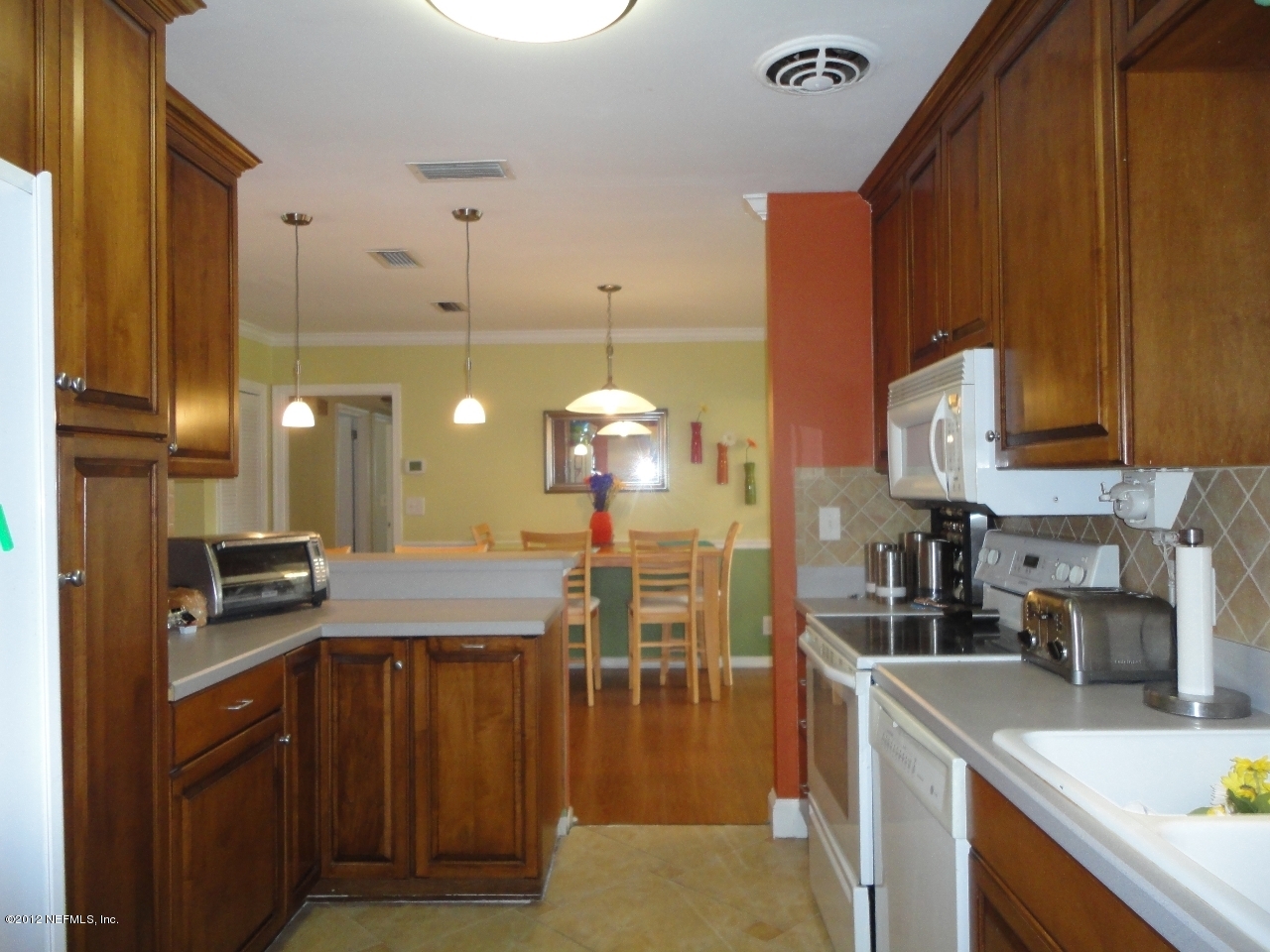 601 Mandalay Road Jacksonville, FL 32216 - Photo 11 of 25 Kitchen to present Dining Area