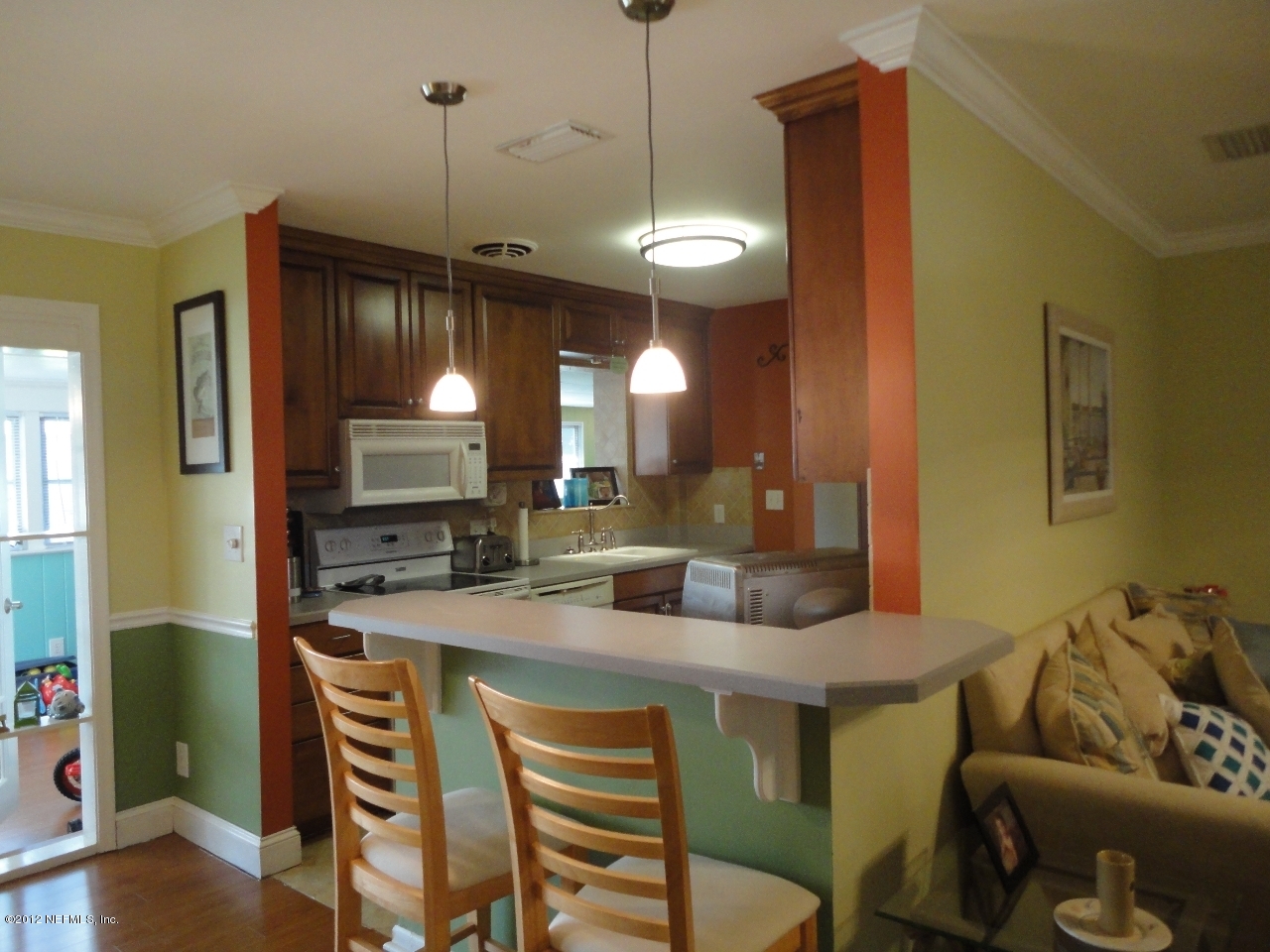 601 Mandalay Road Jacksonville, FL 32216 - Photo 4 of 25 Living Room, Dining Area and Open Kitchn