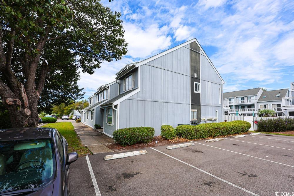3700 Golf Colony Lane, Unit 5B Little River, SC 29566 - Photo 25 of 27 View of property with uncovered parking