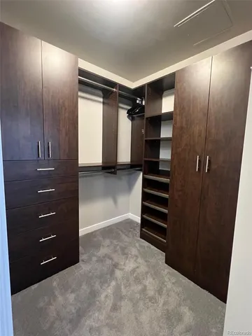 a view of a hallway with washer and dryer