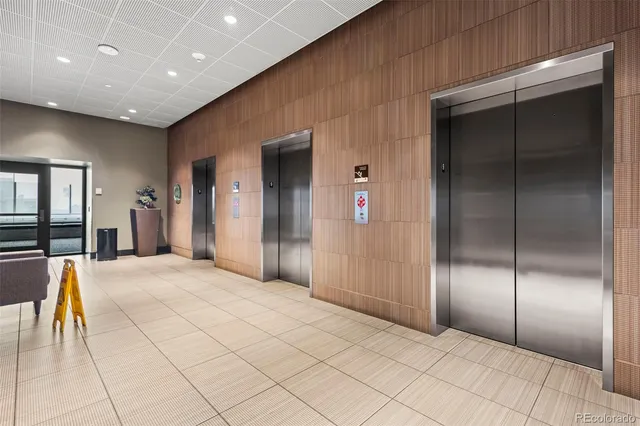 a view of a kitchen with a sink and cabinets