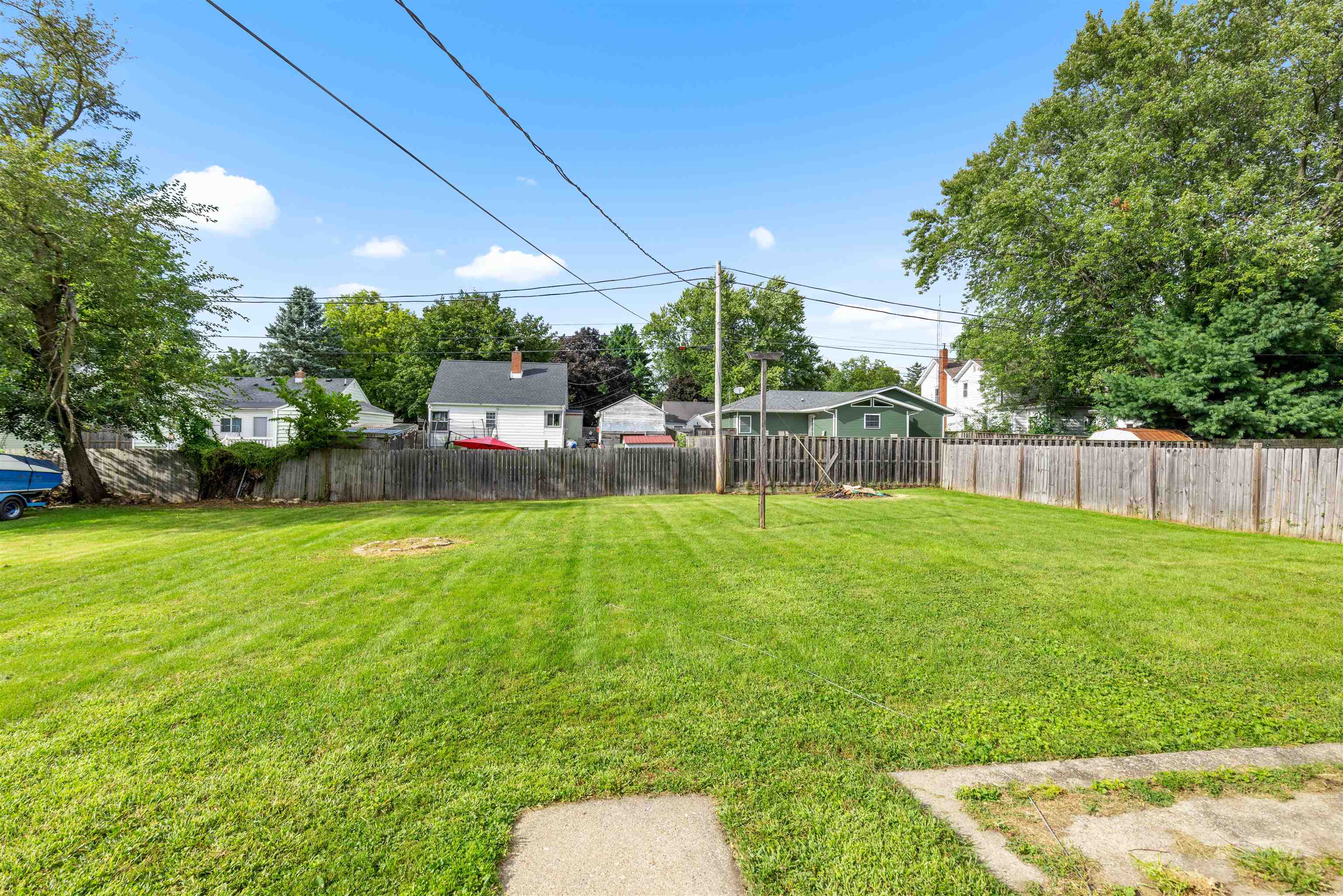 306 West Front Street Mount Morris, IL 61054 - Photo 13 of 15 a view of a backyard with a garden and entertaining space