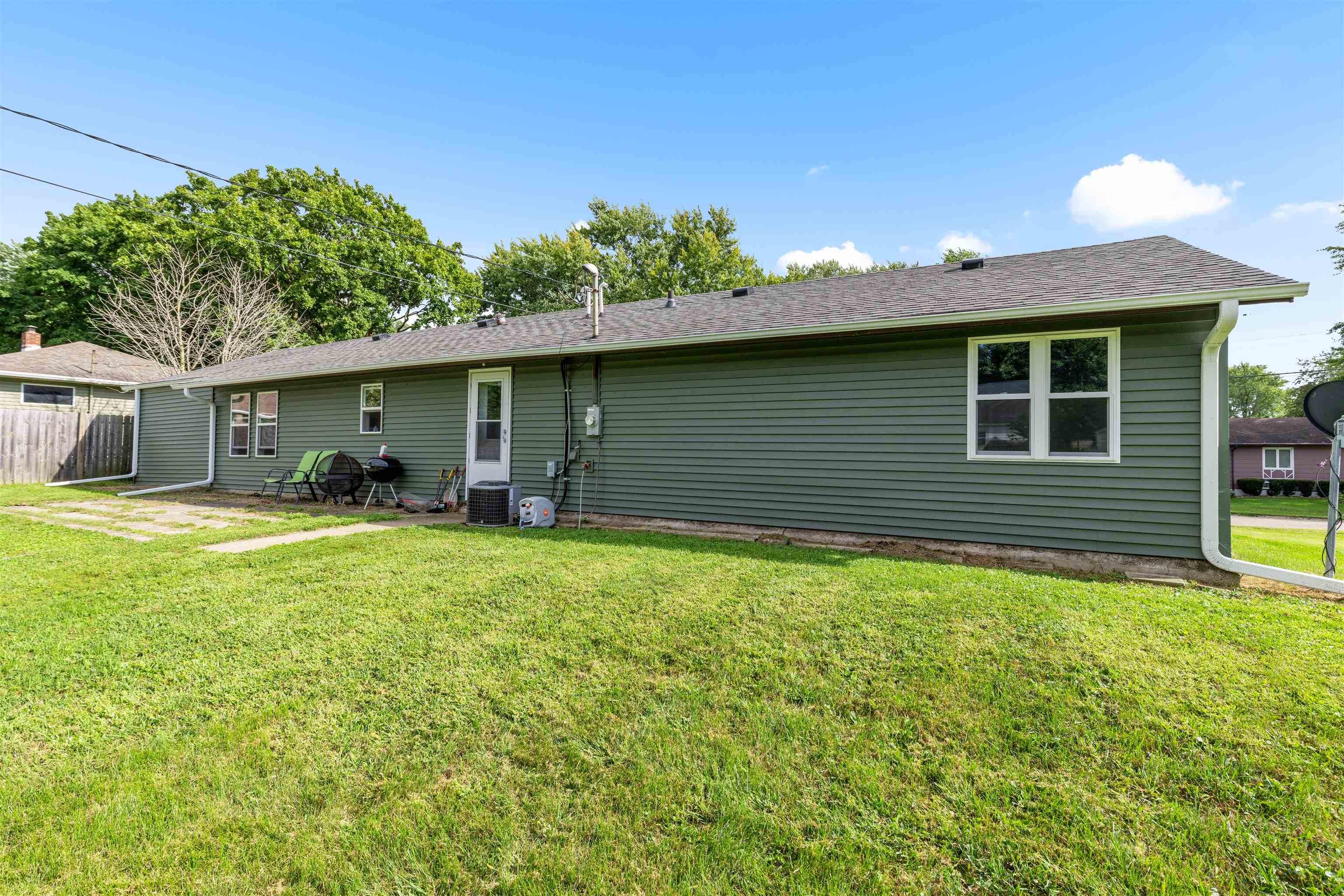 306 West Front Street Mount Morris, IL 61054 - Photo 15 of 15 a front view of a house with a yard