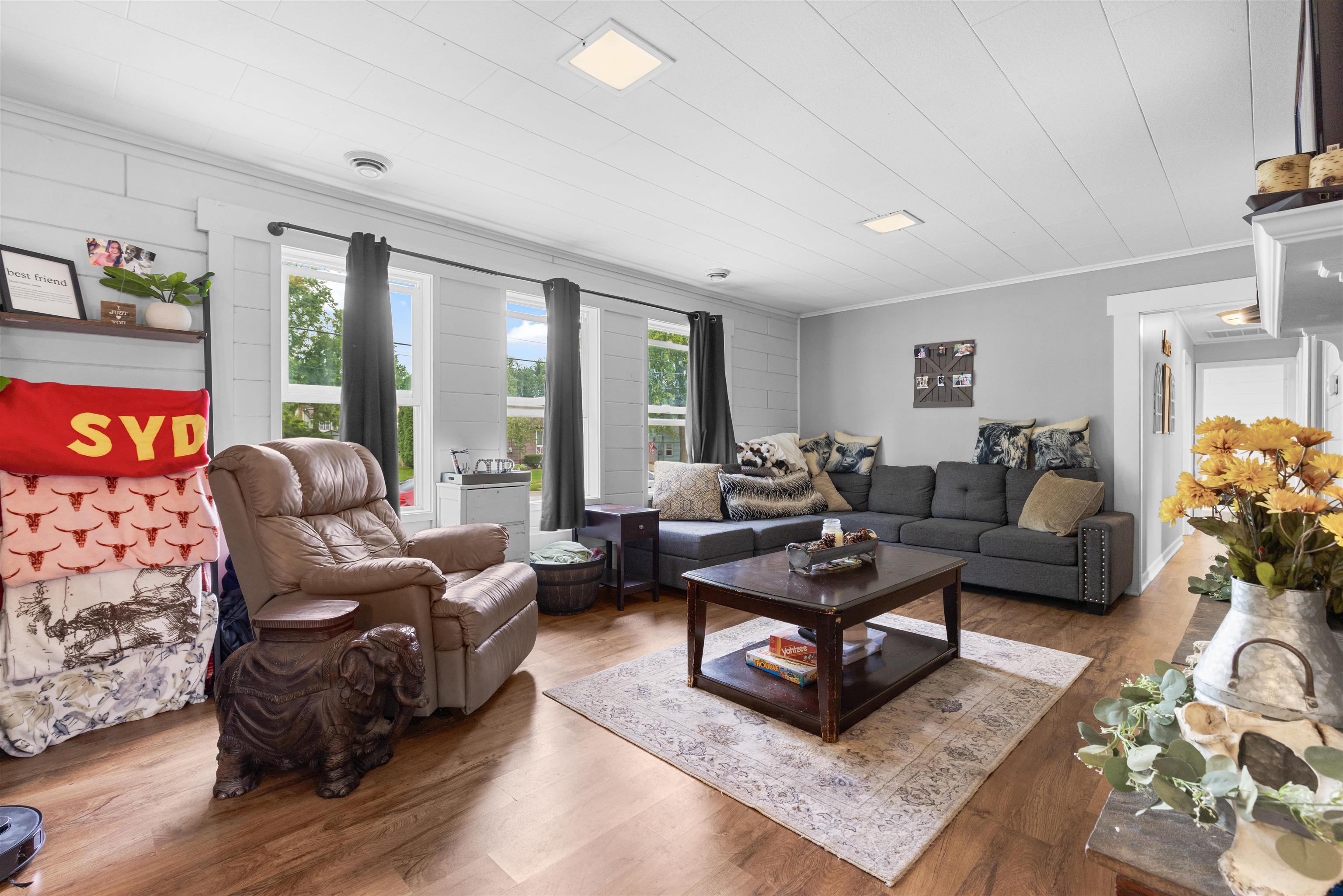 306 West Front Street Mount Morris, IL 61054 - Photo 2 of 15 a living room with furniture and a large window