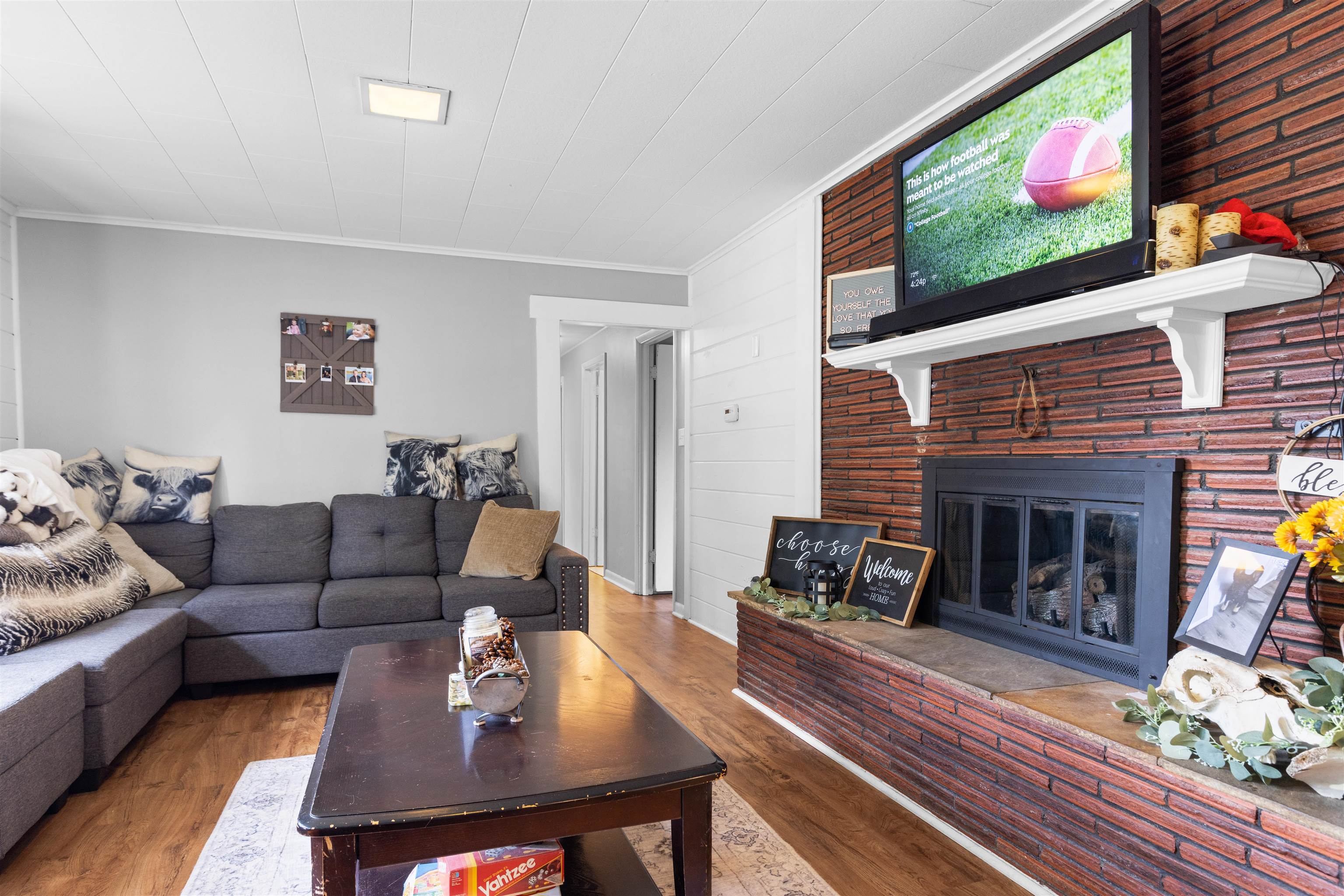 306 West Front Street Mount Morris, IL 61054 - Photo 3 of 15 a living room with furniture and a fireplace