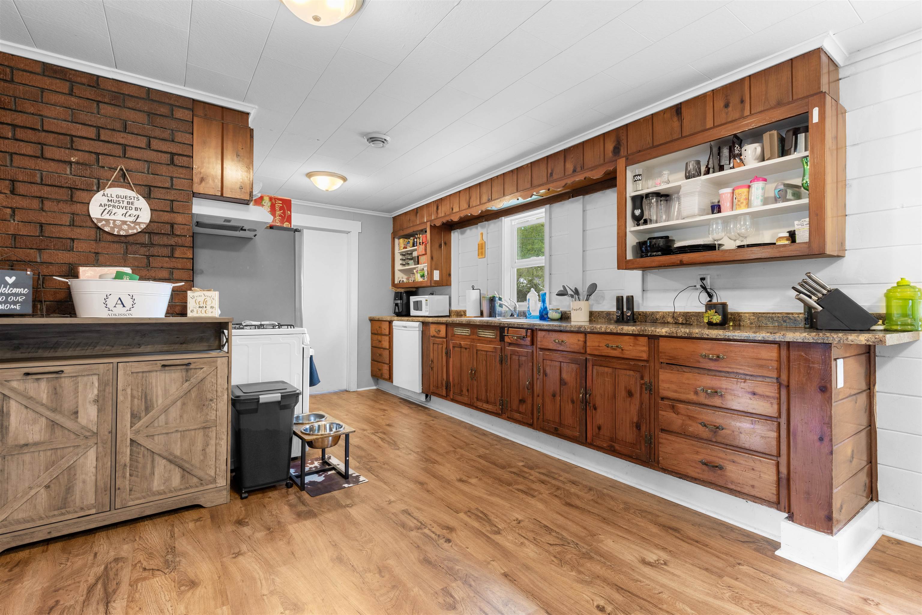 306 West Front Street Mount Morris, IL 61054 - Photo 5 of 15 a kitchen with stainless steel appliances granite countertop a sink and cabinets