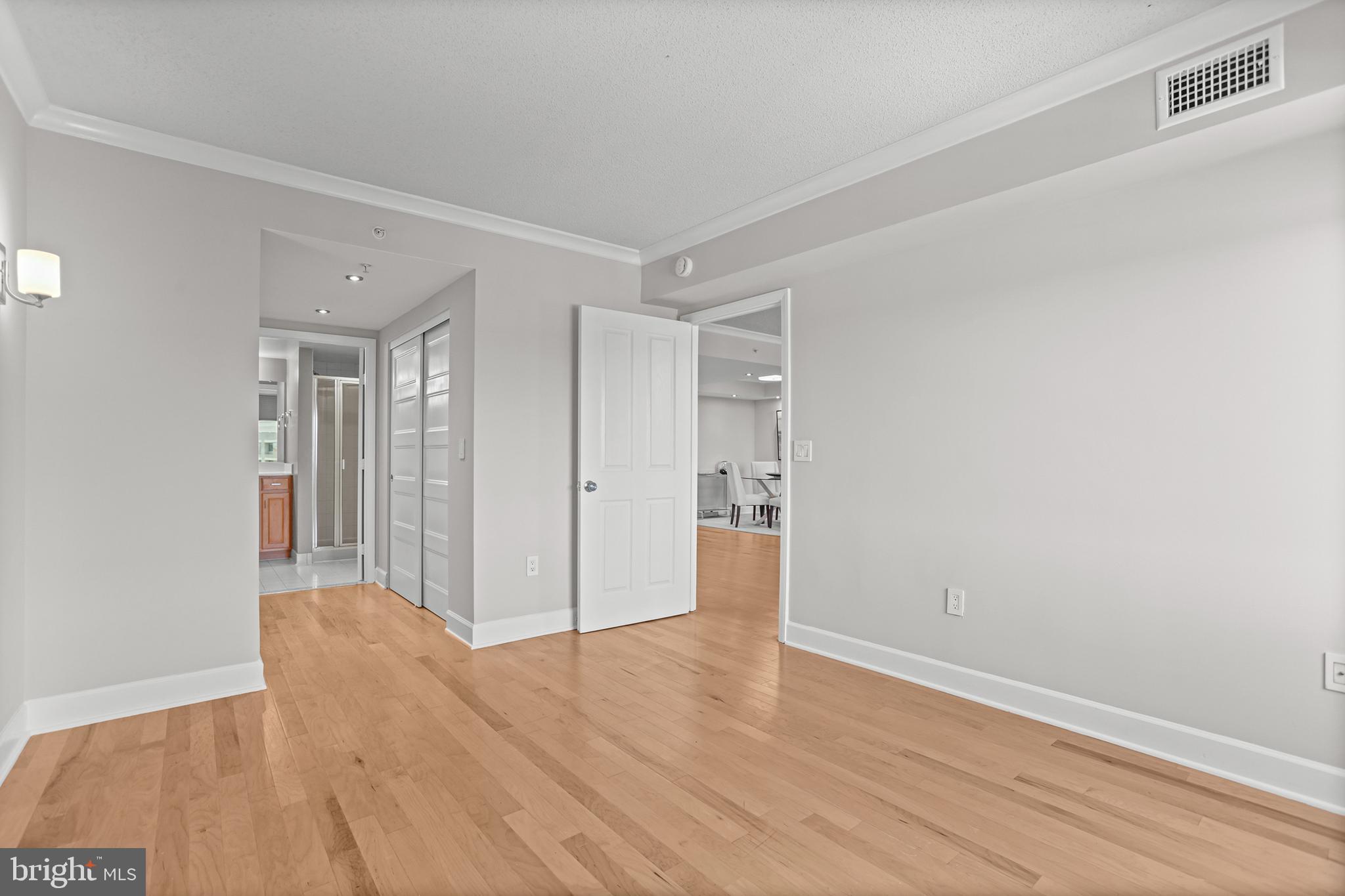 1220 North Fillmore Street, Unit 602 Arlington, VA 22201 - Photo 23 of 43 a view of a room with wooden floor