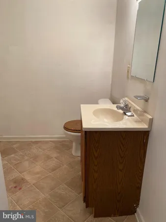 a bathroom with a sink and a vanity