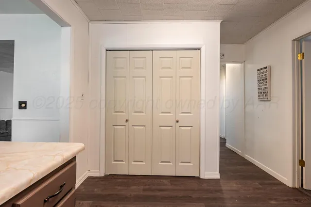 wooden floor with cabinet