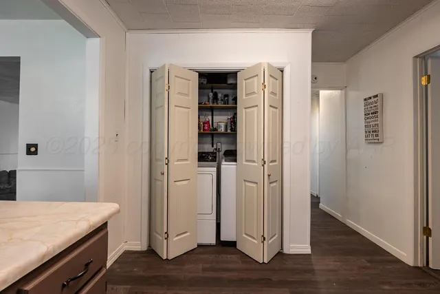 a view of a hardwood & kitchen